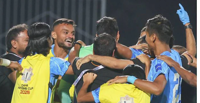 Alt Text: India football team celebrating after defeating Oman on penalties at CAFA Nations Cup